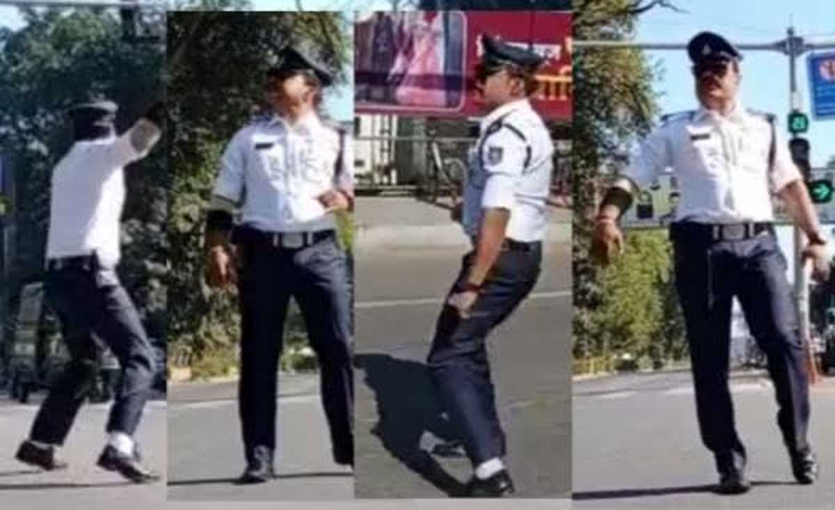 सिग्नल पर डांस करते ट्रैफिक पुलिस को देख लोगों ने कहा वाह, अब करेंगे ट्रैफिक रूल फॉलो सिग्नल पर डांस करते ट्रैफिक पुलिस को देख लोगों ने कहा वाह, अब करेंगे ट्रैफिक रूल फॉलो